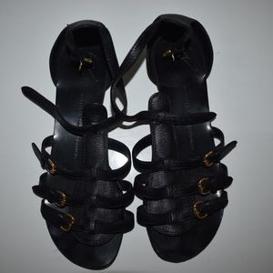 Black giuseppe zanotti sandals with gold accents